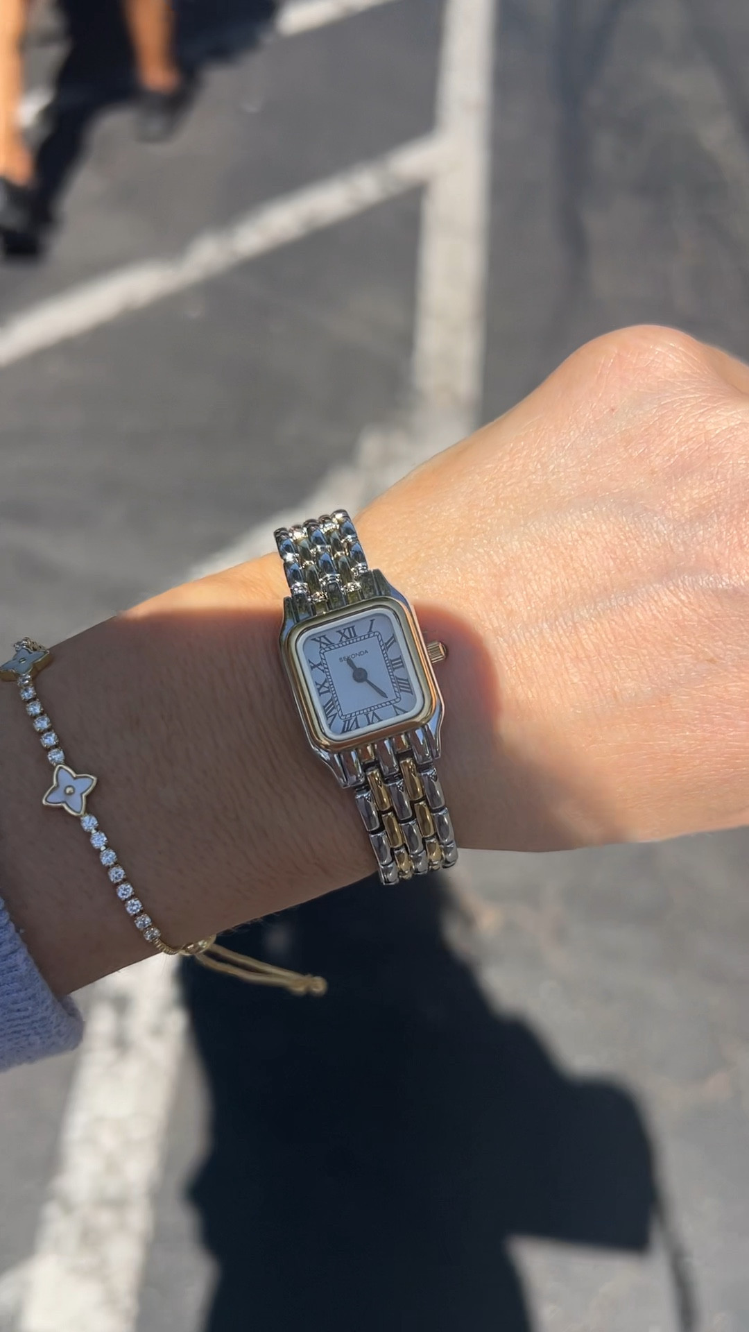Silver and gold watch, small watch 

#LTKVideo #LTKSeasonal #LTKFindsUnder100