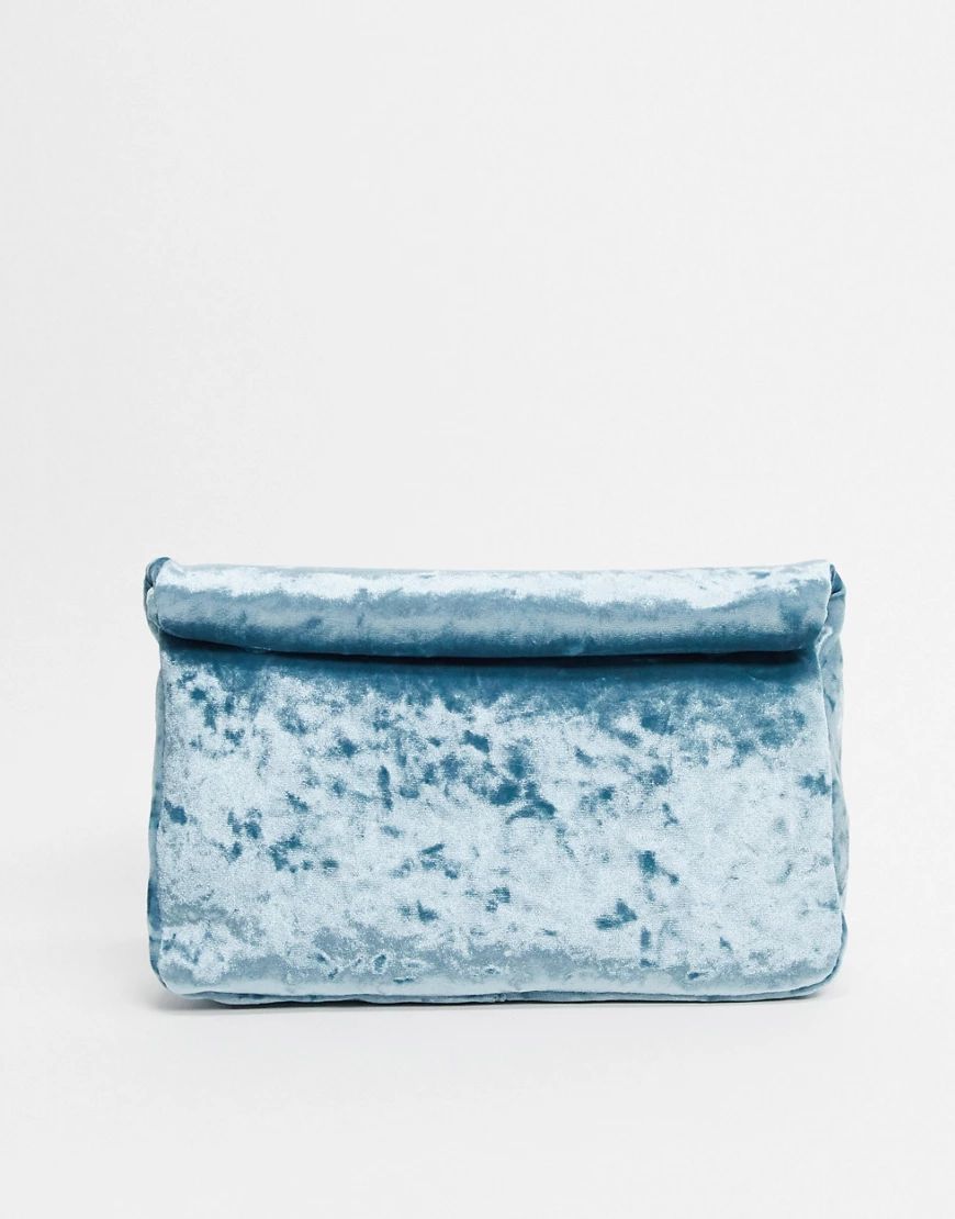 ASOS DESIGN roll top velvet clutch in blue | ASOS (Global)