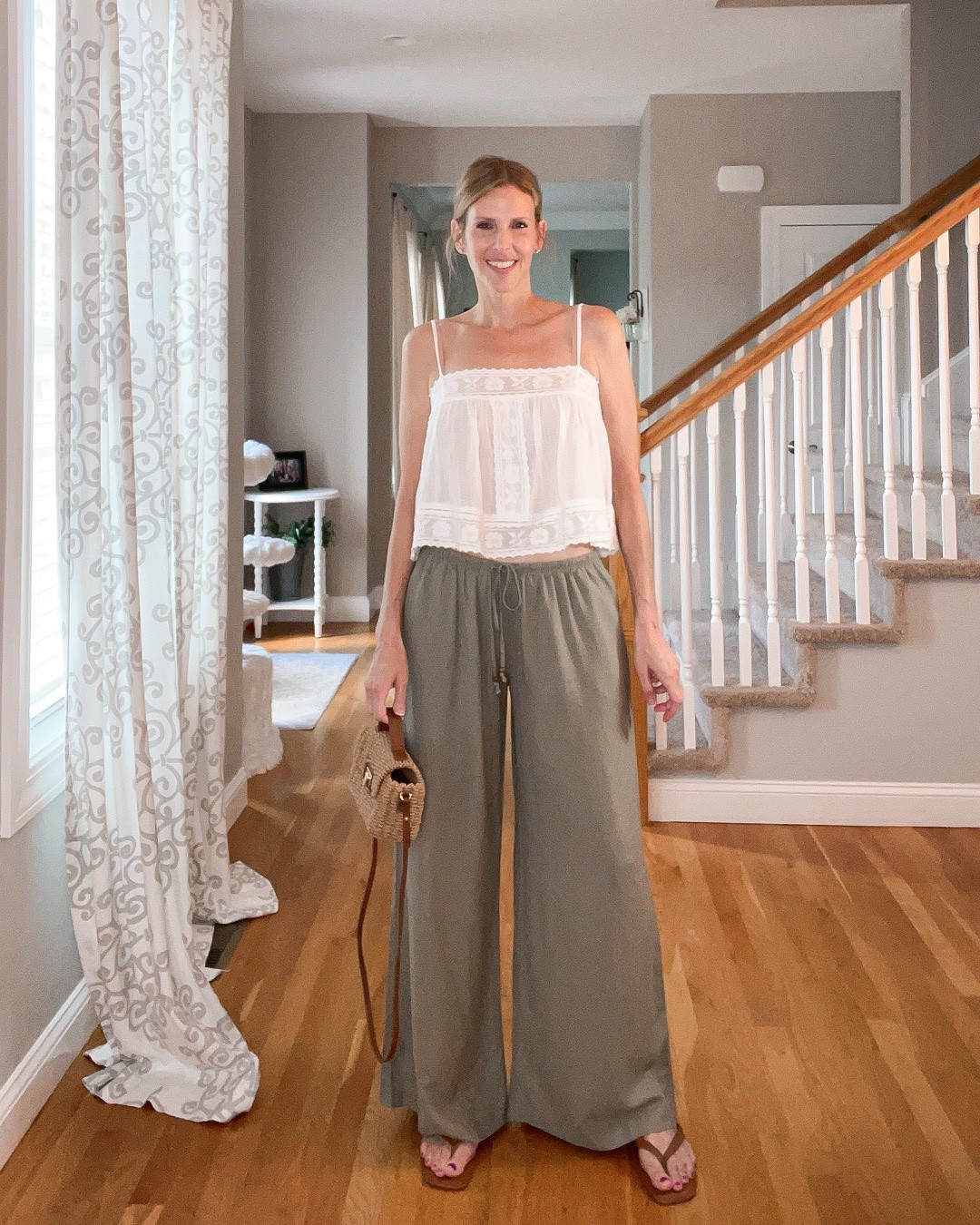 Summer neutrals ☀️🤍 Flowy pants, a breezy top, and sandals—the kind of outfit I reach for all season long. ✨👜

#LTKOver40 #LTKSeasonal #LTKootd