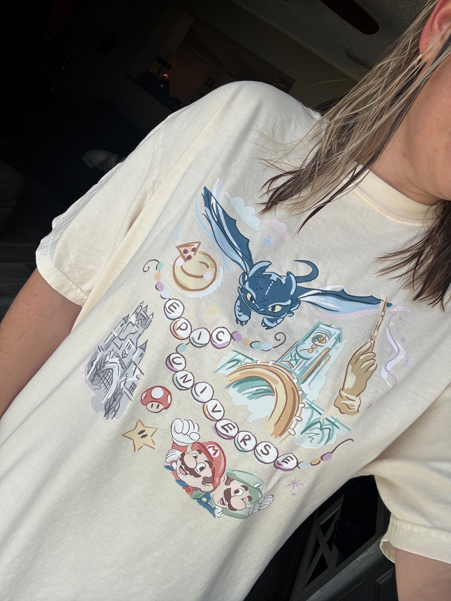 This is the perfect shirt to wear at Epic Universe that represents all the portals. I’m wearing a size Large and it runs large.

#LTKFindsUnder50