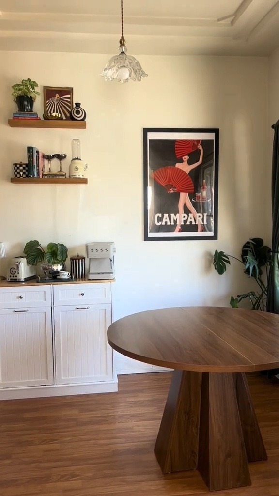 a long anticipated change!!! for the longest time I couldn’t decide on a shape but I finally went with a walnut, round dining table 🤤 dining chairs to come! stay tuned 📻 table is linked in my LTK!

#homedecor #midcenturymodern #vintagehome #artdeco #apartmentinspo 

#LTKU #LTKHome #LTKSeasonal