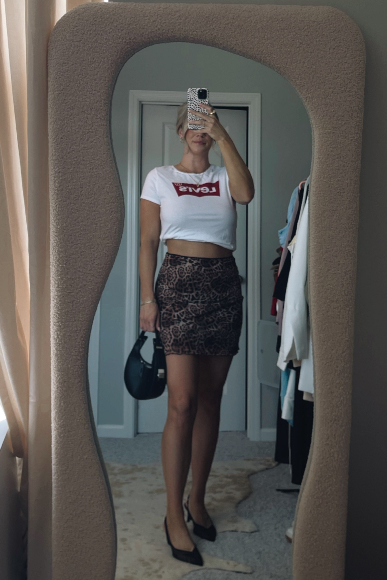 Outfit that can be dressed up or down. Animal print with a pop of red is so cute for a date night or day time elevated look. Levi’s tee is in a size M and fits great. #LTKDateNight #OOTD 

#LTKFindsUnder50