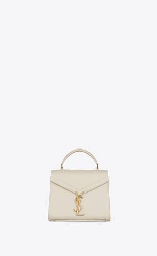 Bag with a front flap, made with metal free tanned leather and decorated with a pivoting metal CA... | Saint Laurent Inc. (Global)