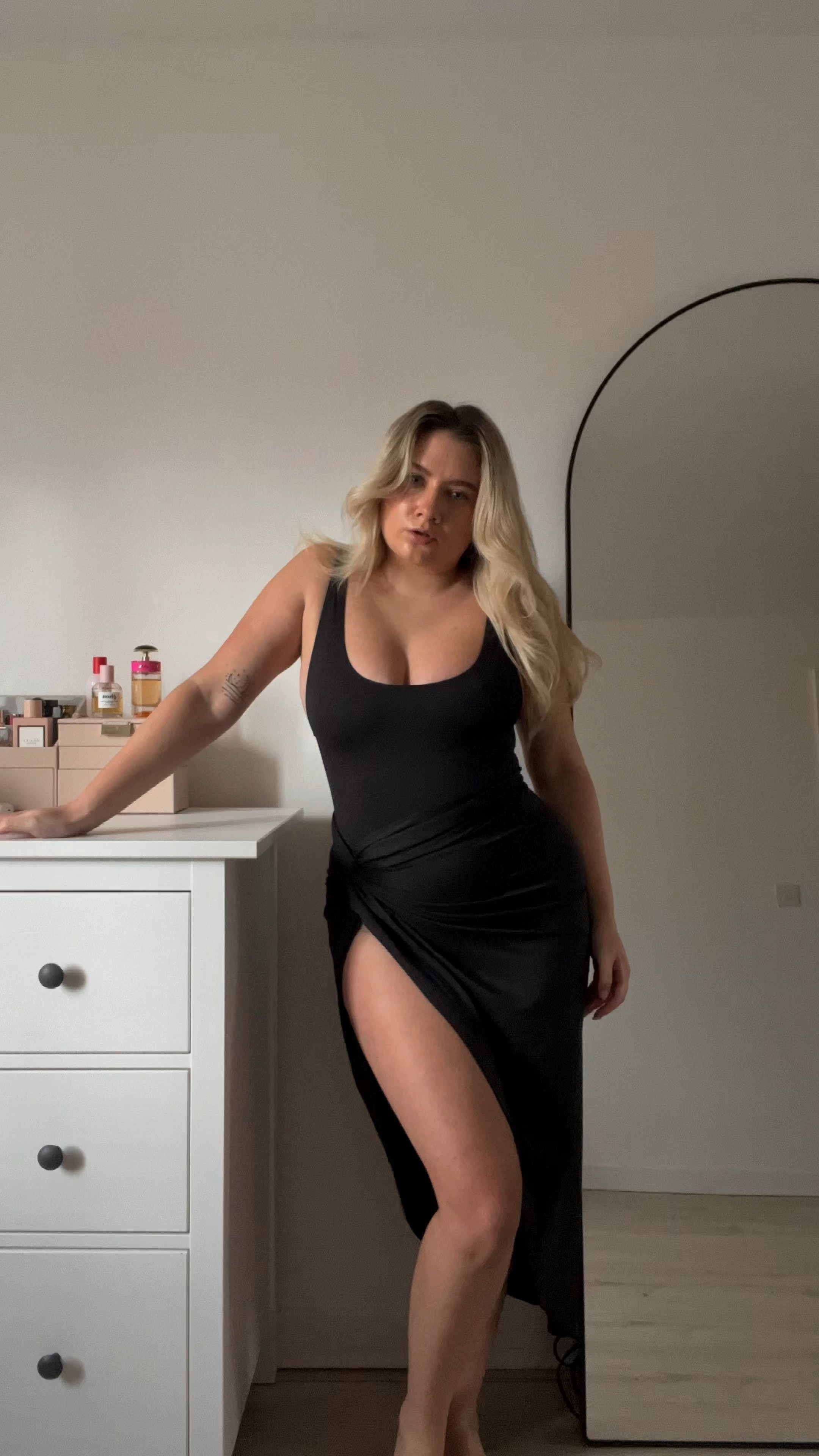 skims swimwear haul featuring a black square neck one piece swimsuit, a slit sarong skirt, and a tie bikini triangle top

#LTKeurope #LTKswim #LTKstyletip