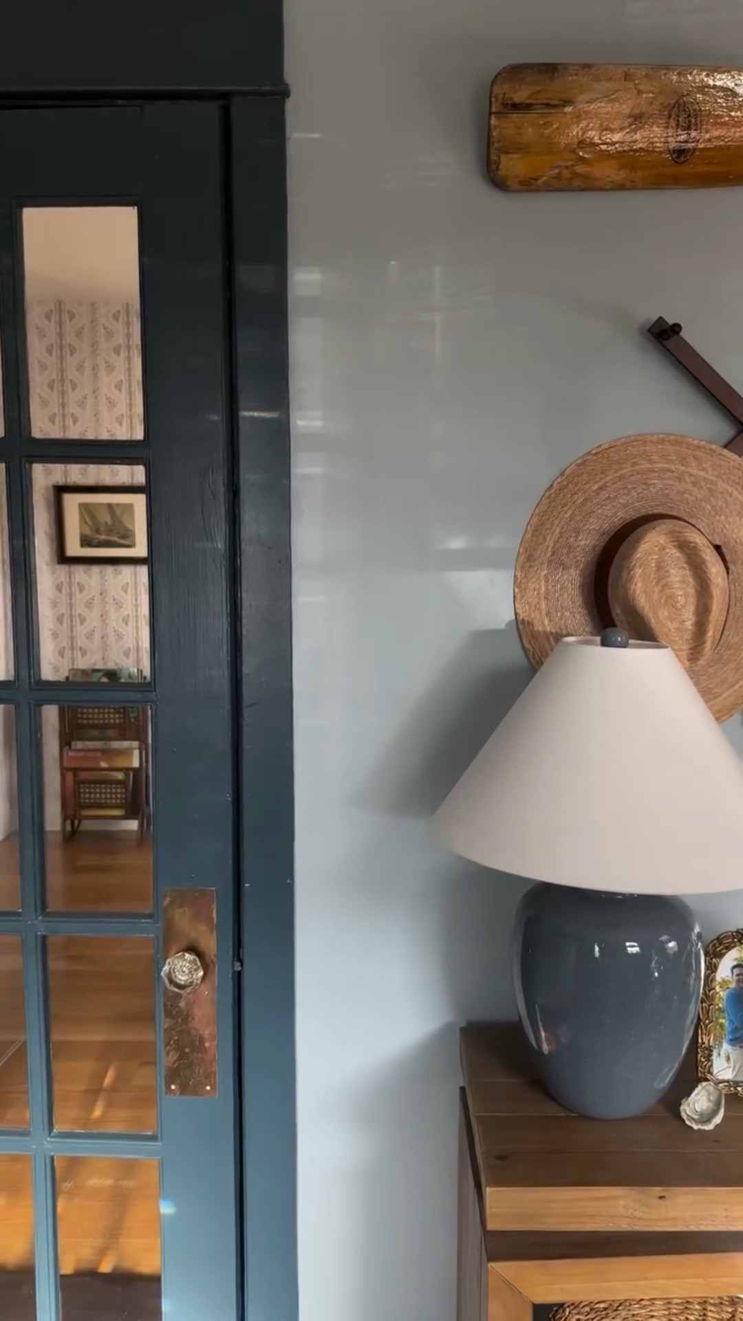 Our mudroom paint color combination is one that effortlessly transforms any space into a sanctuary 🤍 Details:
 
Walls: Santorini Blue
Trim + Doors: New Providence Navy
Both by Benjamin Moore 

Comment SHOP below to receive a DM with the link to this post on my LTK ⬇ https://liketk.it/5GLLM

#mudroomdesign #mudroommakeover #coastalcottage #traditionalhome #traditionalhome #entrywaydesign