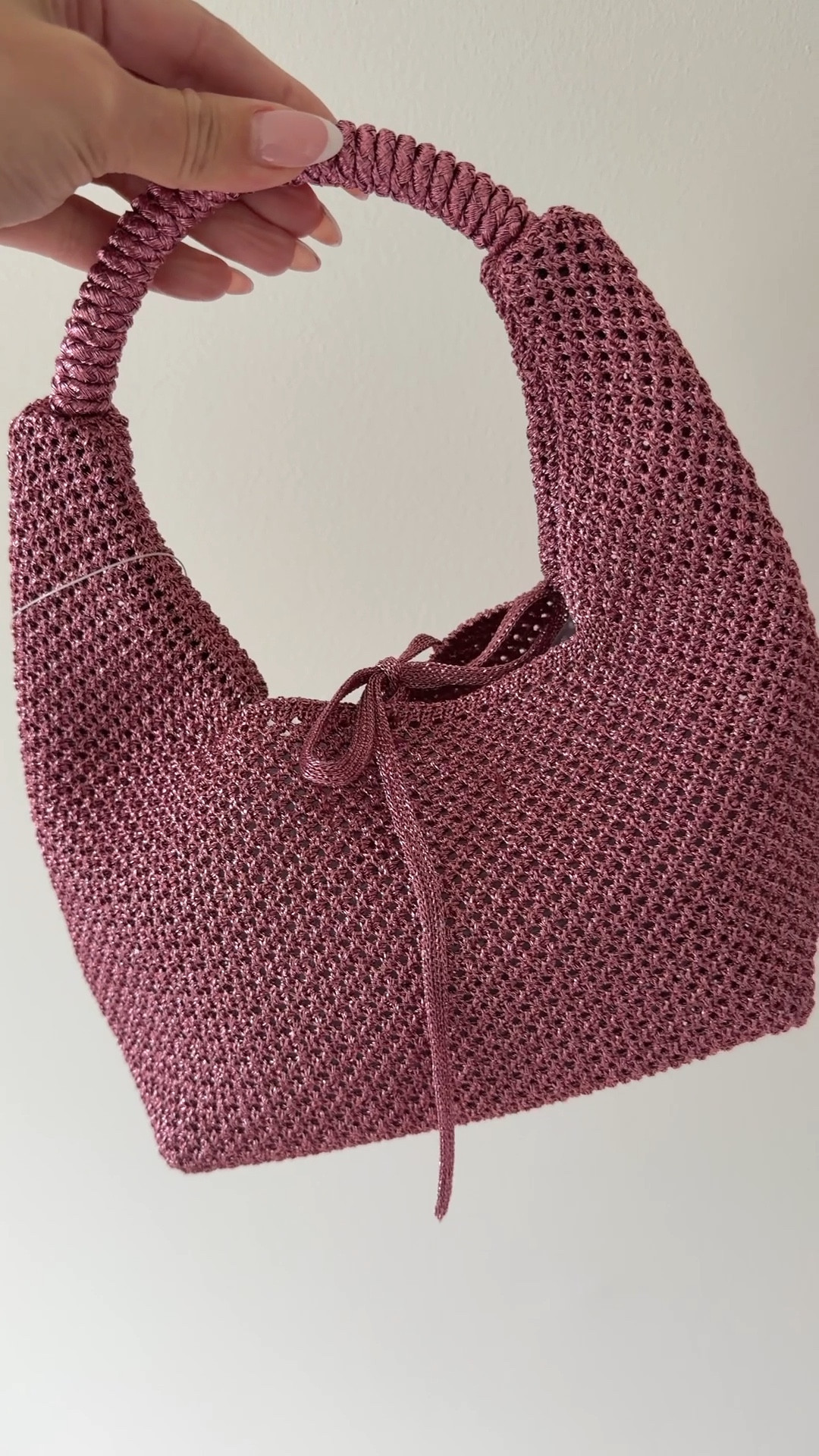 This pink purse is so pretty it almost has a sparkly look to it. Summer, spring, affordable, bag.

#LTKootd #LTKSaleAlert