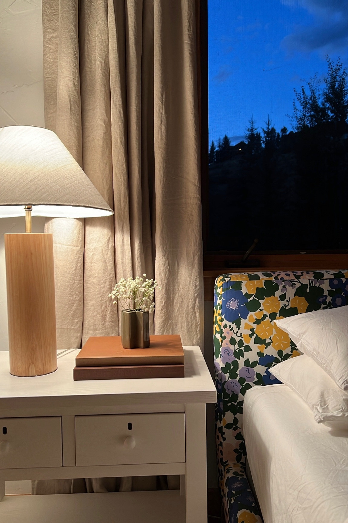 This beautiful bedroom is the perfect retreat after a long day. The floral headboard adds a pop of color to this otherwise neutral space. 

White nightstand, Pottery Barn nightstand, flower pattern bed, table lamp, curtains, bedroom retreat, home decor, primary bedroom, girls bedroom, Shannon Russo Interiors, The Inside, West Elm

#LTKhome #LTKFind #LTKfamily
