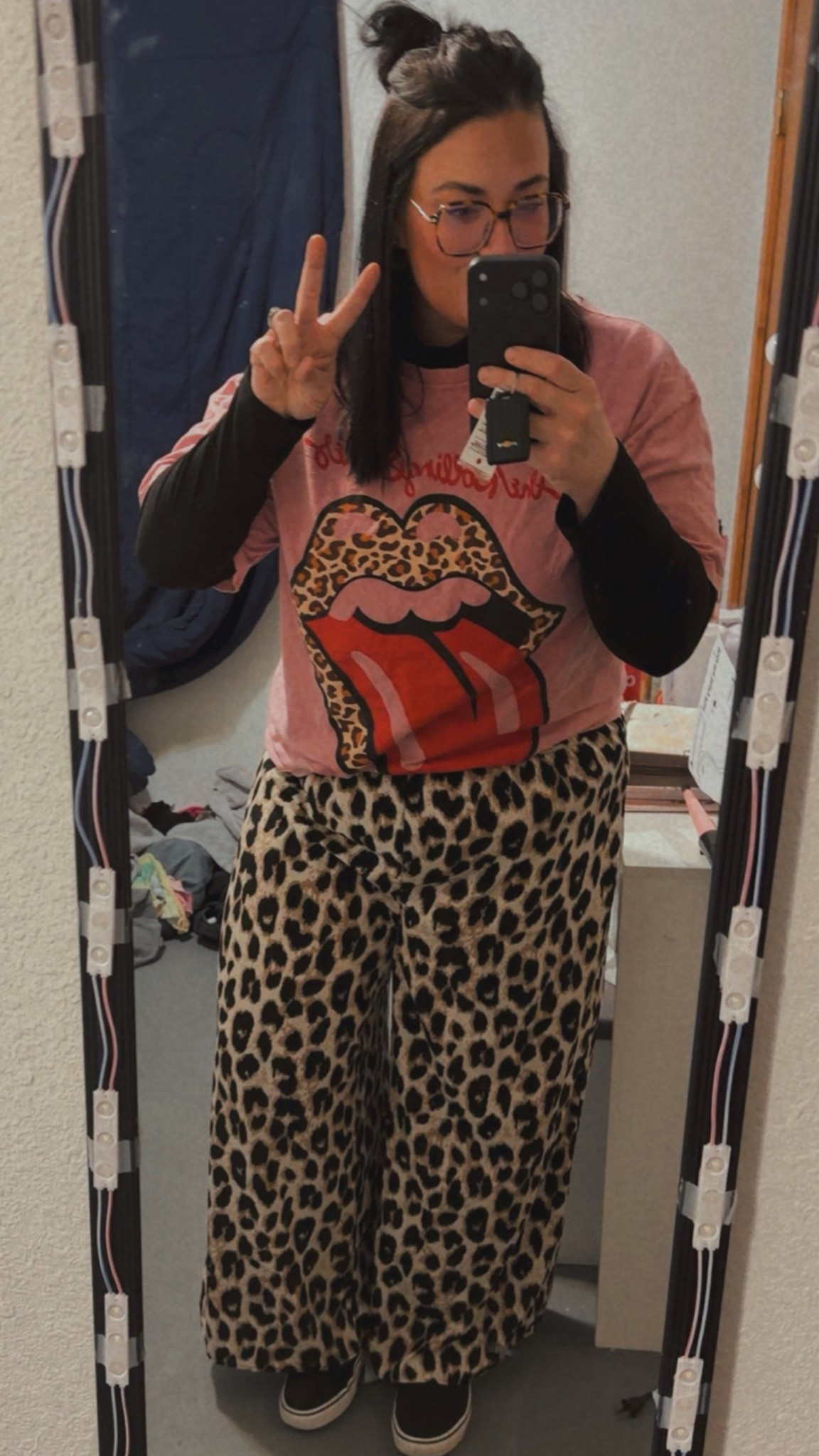 I had to find a dupe shirt due to this one not being purchased online (purchased at Factory Connections). Love this outfit and I get a ton of compliments on it. #bandtee #cheetahprint #cheetahprintpants 

#LTKPlusSize #LTKootd #LTKMidsize
