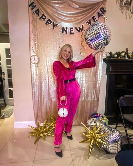 Happy new year! New years eve outfit, pink outfit for new years, Barbie winter outfit, disco ball purse, rhinestone purse, fuchsia jumpsuit outfit idea 

#LTKparties #LTKHoliday #LTKSeasonal