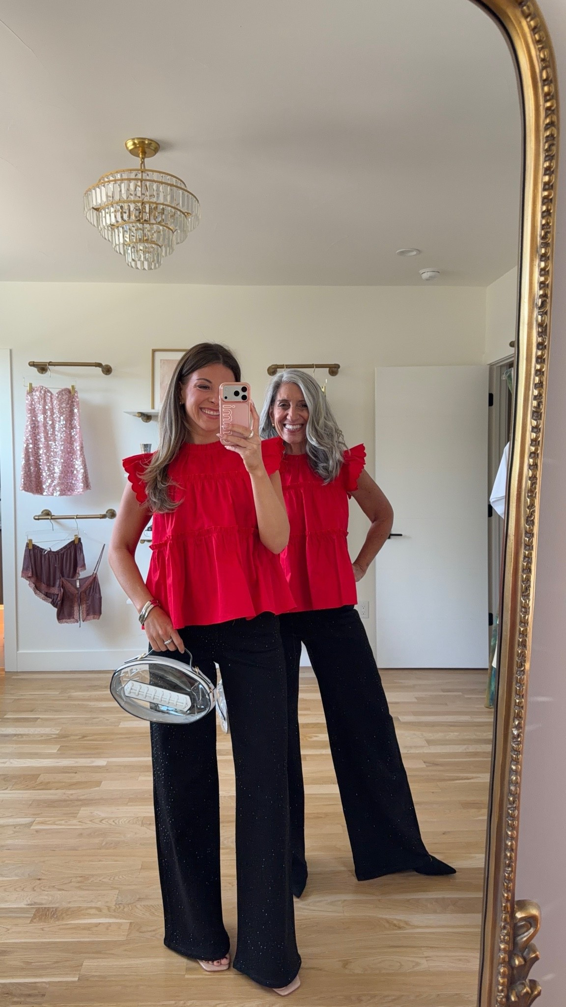 mom & me matching red ruffle-sleeve tiered tops with black wide-leg gemstone detail jeans game day look for your next sporting event! 🏈 
avara code for 15% off: emerson 

i'm 5'4" and typically wear a small/2

mom is 5'4" and typically wears a medium/6

mom & me outfits, mom & me dresses, matching outfits, mother daughter outfits, family photo outfits, fall outfits, fall dresses, autumn outfits, midi dresses, fall dresses, casual outfits, thanksgiving outfits, family photo outfits, fall fashion, autumn fashion, cozy outfits, transitional outfits, neutral outfits, everyday outfits, weekend outfits, women’s fashion, sports, athletic, team colors, game day outfit, football outfit

#LTKSeasonal #LTKootd #LTKU