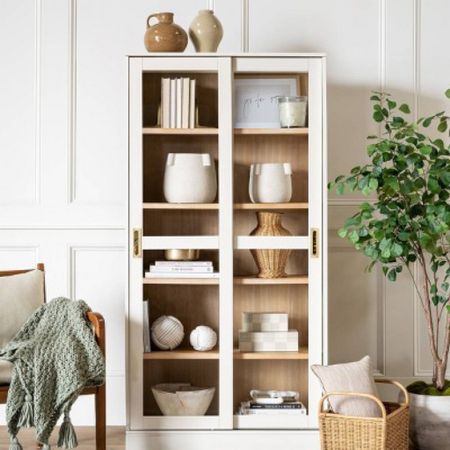 In love with this off white wall unit with shelves and sliding doors with gold accent handles! Perfect for shelf styling, or dishes and glassware. 

Furniture
Modern farmhouse
Modern contemporary 
Bowls
Pottery
Home decor
Accent decor
Faux tree
Arm chair
Throw pillow
Joanna Gaines
Studio McGee
Target finds

#LTKstyletip #LTKunder50 #LTKhome