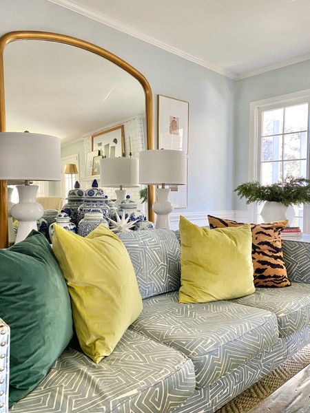 Velvet sofa pillows, leaning mirror, white lamps, green, tiger print, living room decorr

#LTKhome