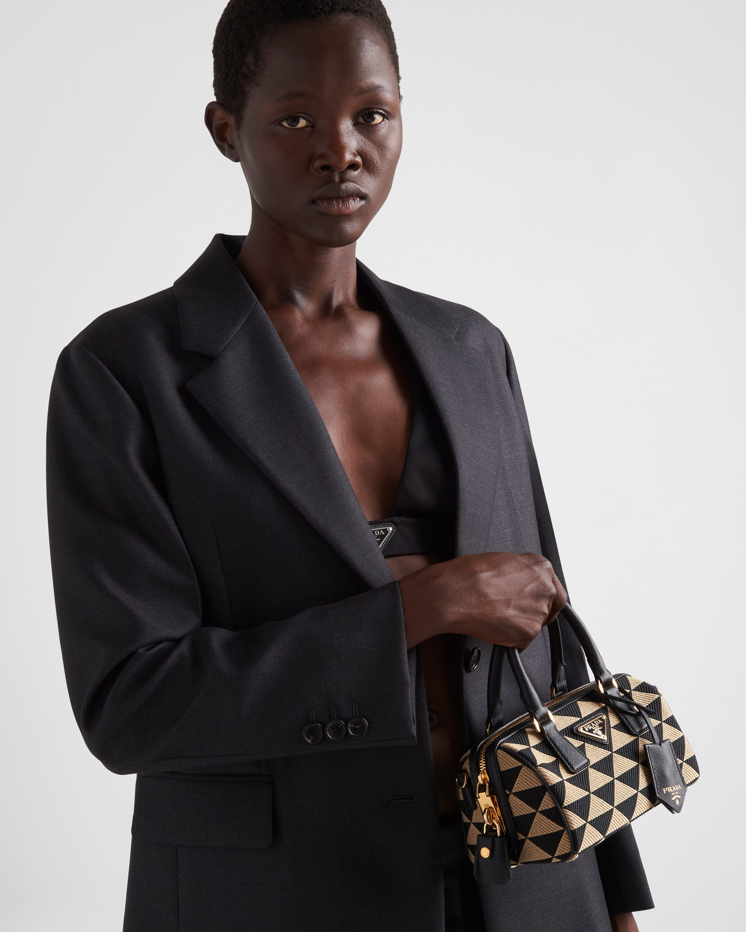 Prada Symbole embroidered fabric top-handle bag | Prada Spa US