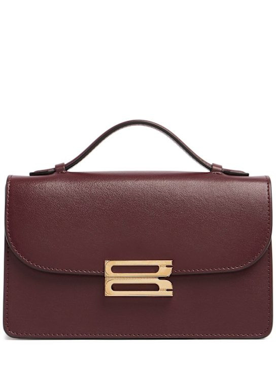 Mini Bbuckle shiny leather bag | Luisaviaroma