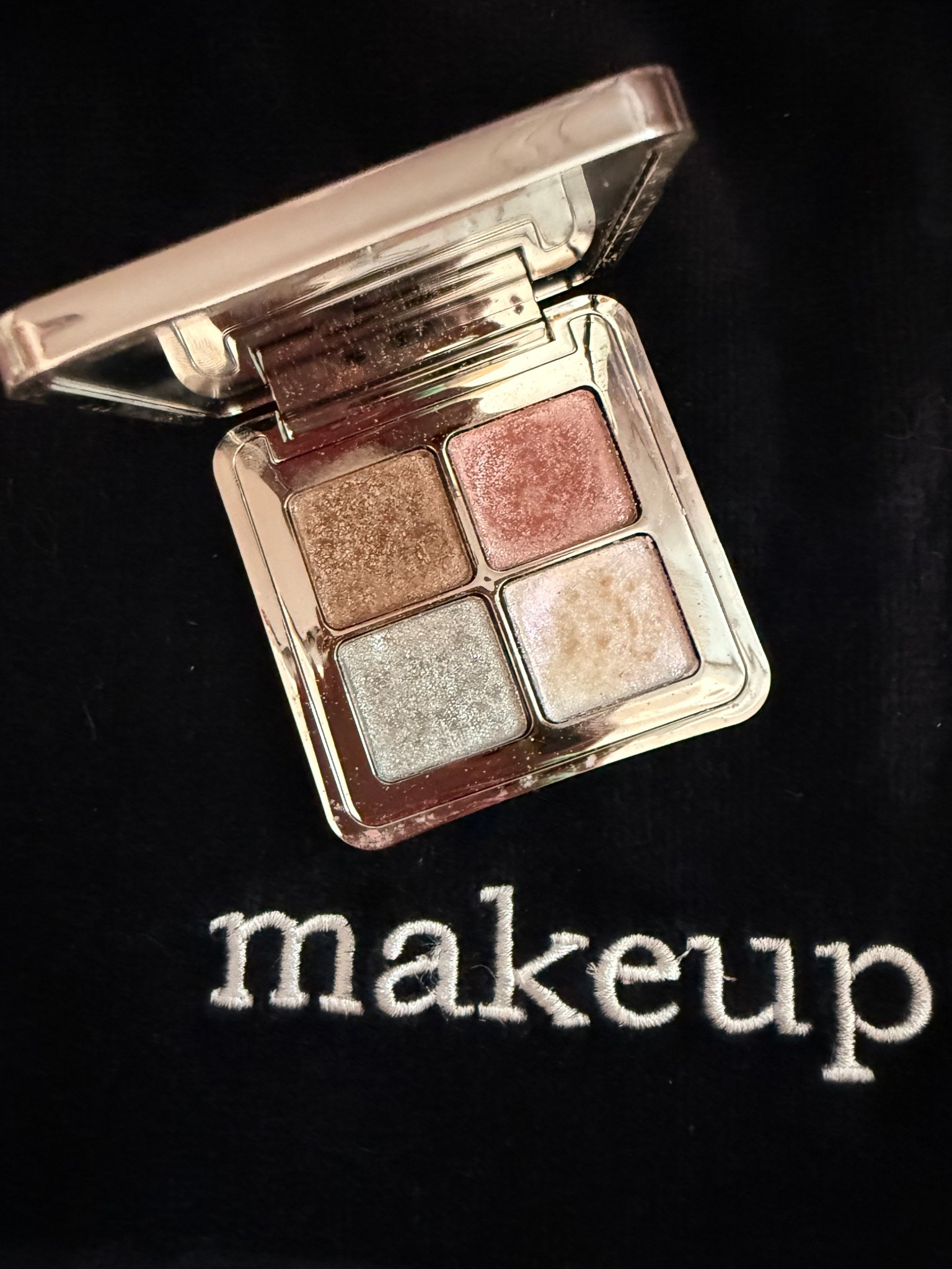 This eyeshadow quad by Kylie cosmetics is a must have! The shimmer in these gives a wet glassy look. They have a buildable coverage, which allows them to be layered over top of another shadow for extra shimmer and glow or used by themselves for a soft subtle glimmer on the eyelids. I cannot recommend this enough. I use it almost every day the shimmer and glow really does give a wet like finish! 

#LTKBeauty #LTKFindsUnder50 #LTKOver40