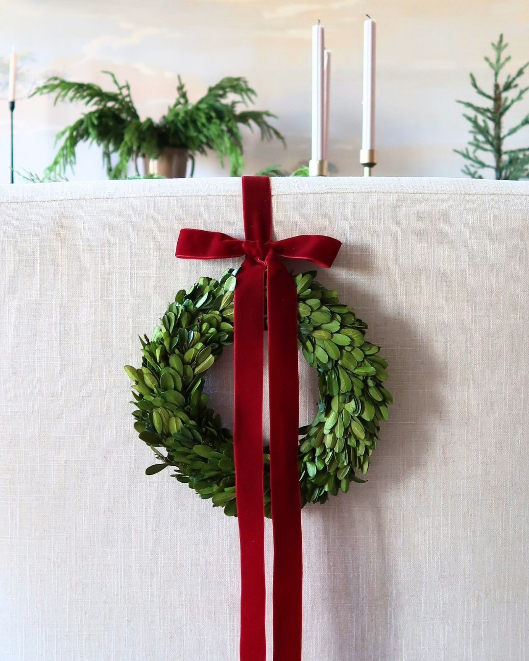 Christmas wreath on upholstered dining chairs

 

 #LTKHoliday #LTKOver40 #LTKHome