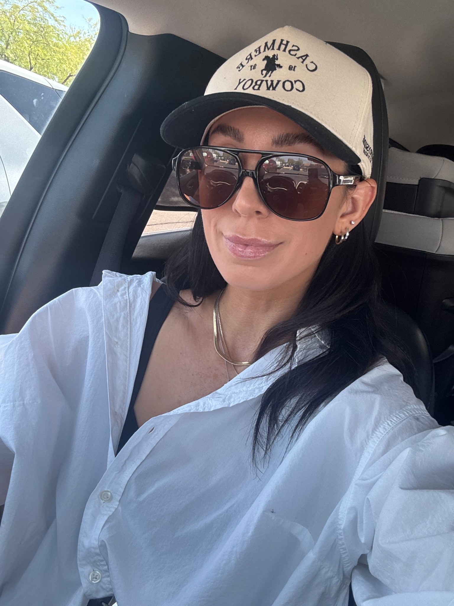 This trucker hat is always on repeat and I love these affordable Amazon sunnies!