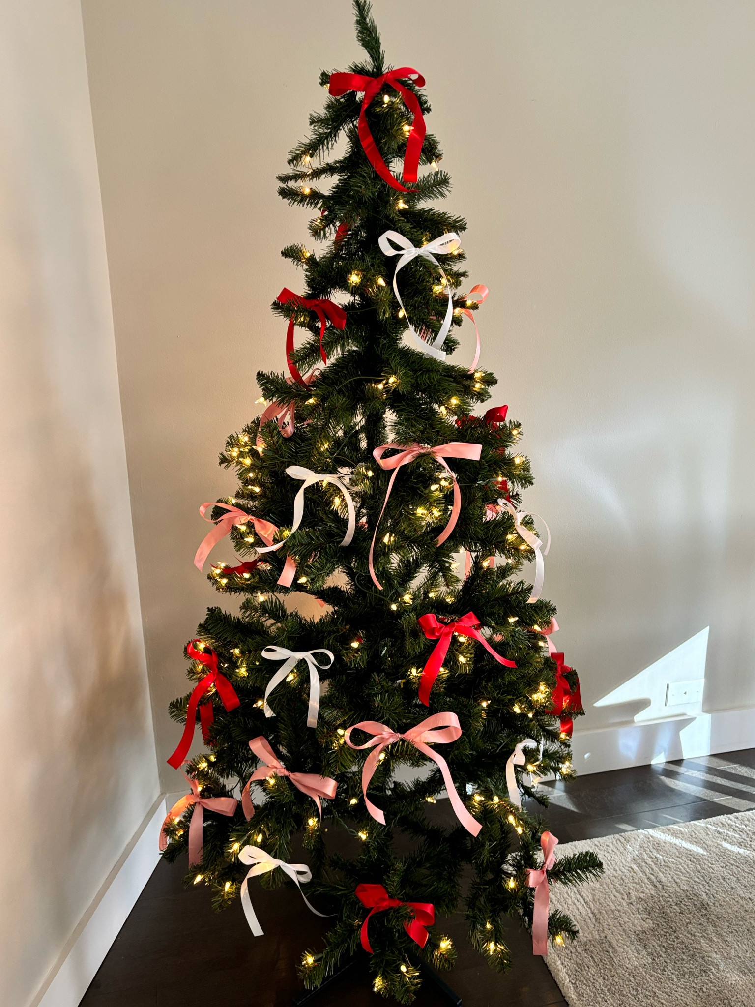 Under $50 prelit tree + satin bows! 

#LTKSeasonal #LTKFindsUnder50 #LTKHoliday