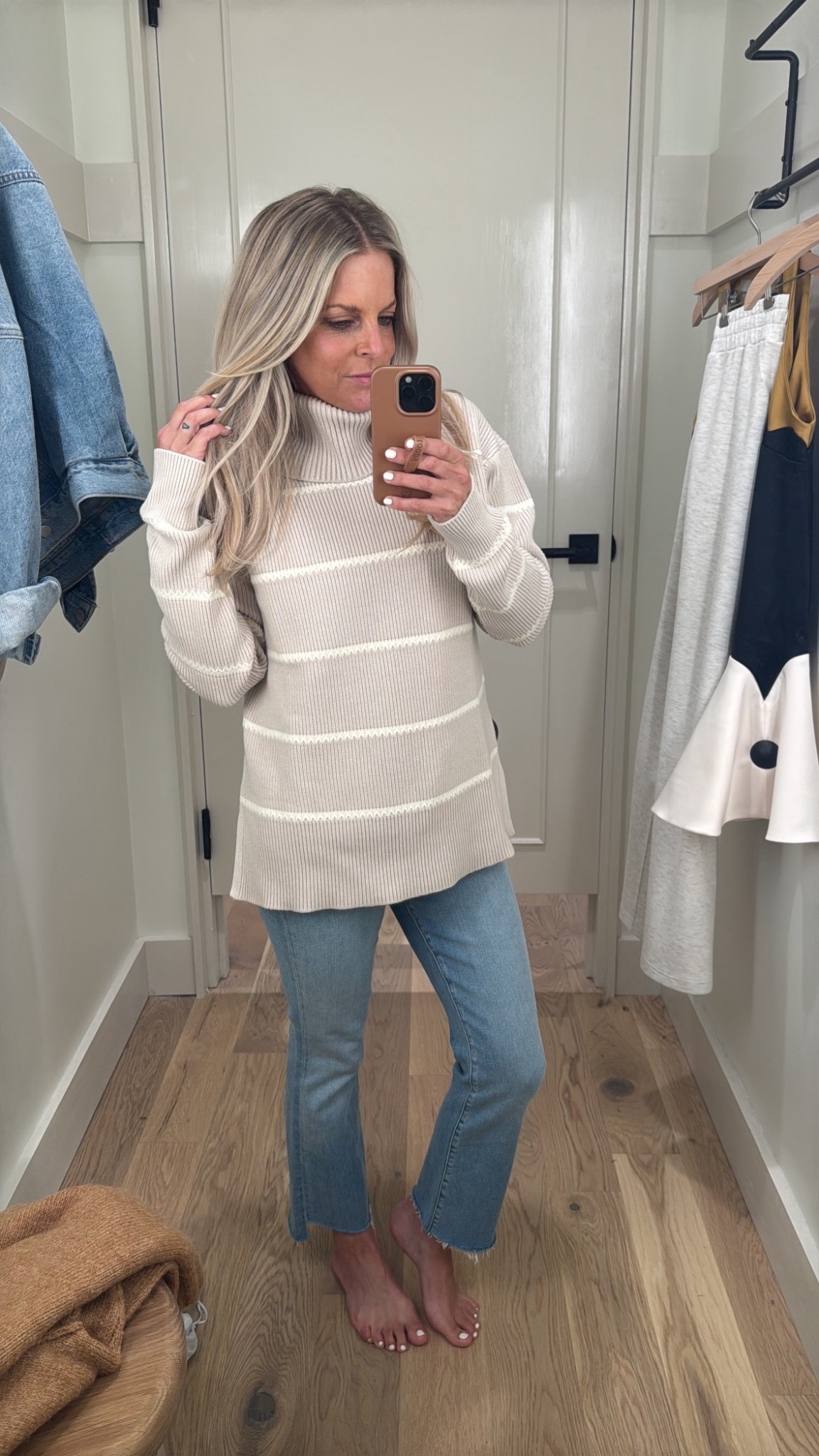Cozy season is here! This roll neck sweater is a total winner and would make for a practical and cute pick to slip into on cold fall days. I love the striped print and slightly oversized fit 🤍🍂

#LTKSeasonal #LTKStyleTip