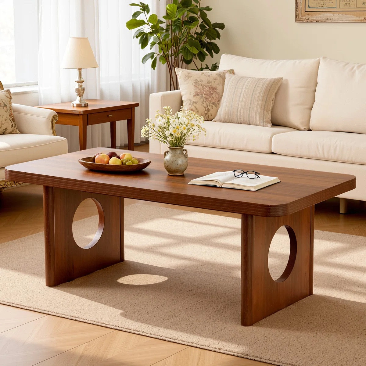 This 47.2” coffee table combines a solid pine wood frame with a durable wood-look top, offering both strength and everyday practicality. Its hollow-out legs add a sculptural, architectural feel, while the rounded corners create a softer, more refined silhouette. ON SALE and under $200.

Keywords:

* pine coffee table
* wood coffee table
* sculptural coffee table
* modern coffee table
* rounded edge table
* minimalist coffee table
* solid wood table
* living room table
* living room decor
* home styling
* interior design ideas
* apartment decor
* cozy living space
* home refresh
* minimalist home
* everyday living
* organic modern design
* sculptural furniture
* warm minimalist
* natural wood aesthetic
* calm interior design
* soft modern style
* neutral home decor
* functional art

#LTKHome #LTKSaleAlert #LTKSeasonal