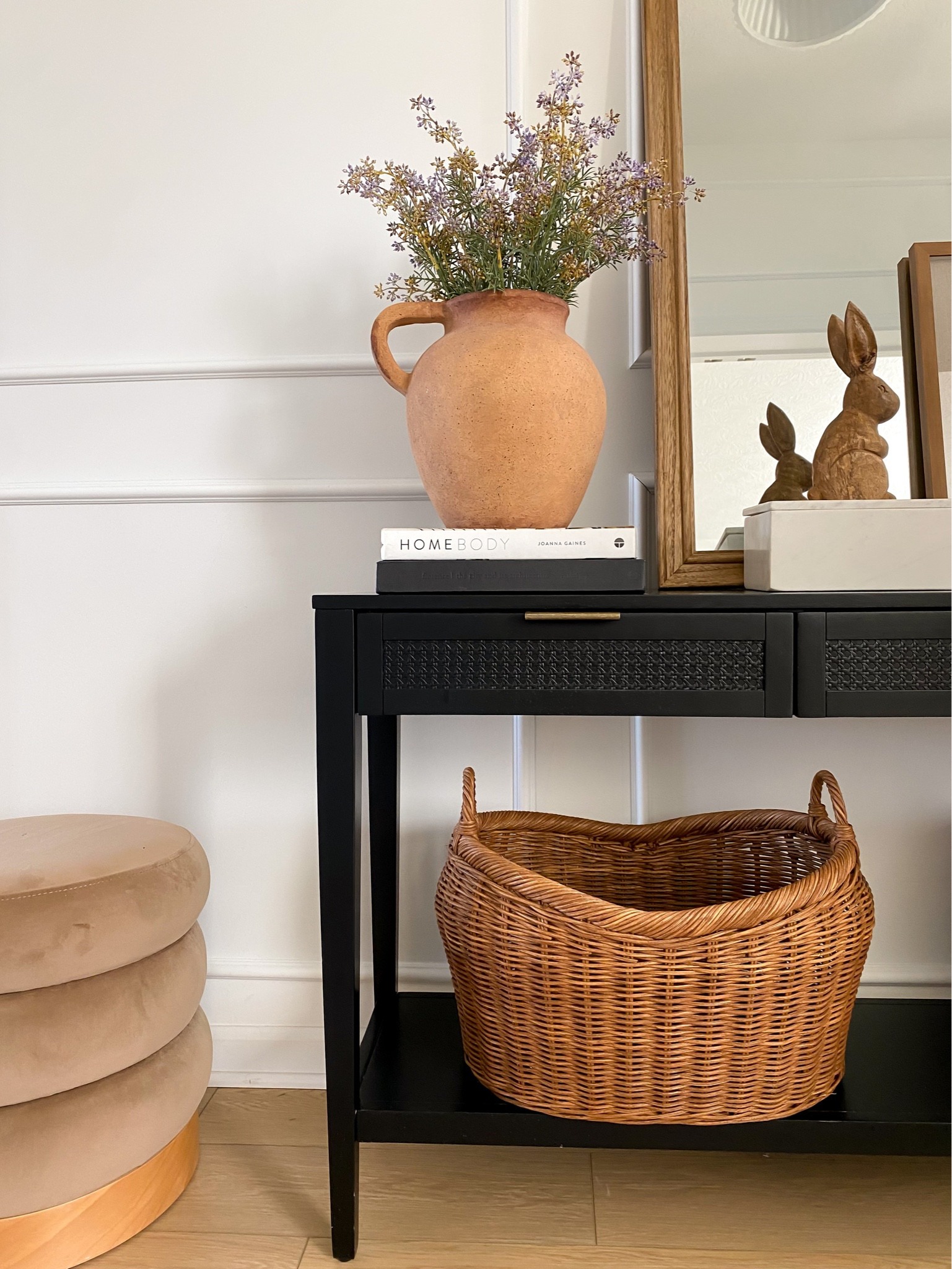 Spring views 

Console table stems basket ottoman 

#LTKhome #LTKSeasonal #LTKfindsunder50