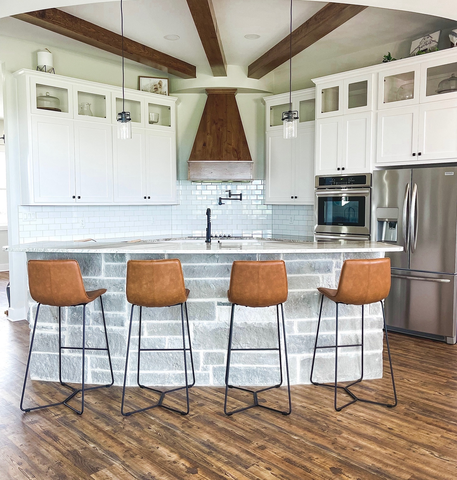 These Tan Upholstered Metal Bar Stools with Back are the perfect addition to our kitchen. Super comfy and well supported! 

#LTKSeasonal #LTKhome #LTKfamily