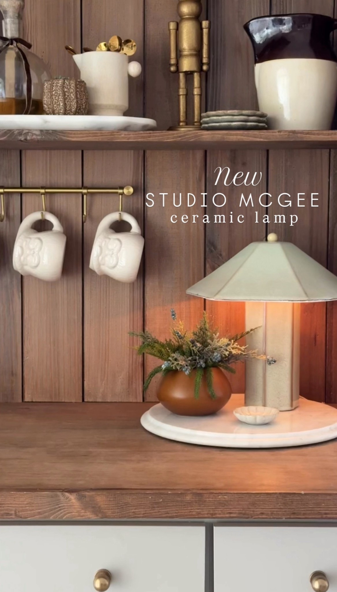 Coffee bar | Christmas coffee bar | Santa mugs | mug rack | Christmas stems | winter colors | studio McGee | studio McGee lamp | studio McGee ceramic lamp | gold nutcracker | coffee bar decor | vintage pitcher | spoons | decanter | white Santa mug | holiday mugs | ceramic coaster | target | magnolia | amazon | Etsy 

#LTKHome #LTKFindsUnder50 #LTKHoliday