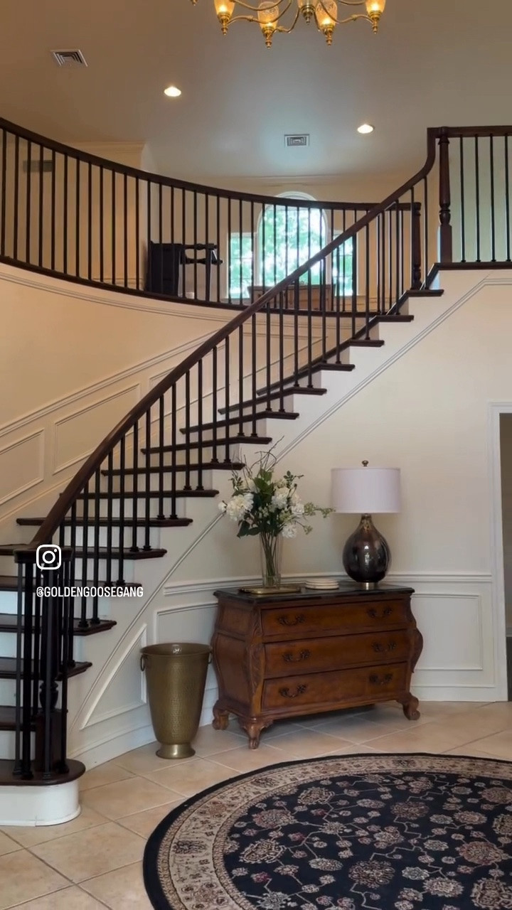 Yesterday I shared the progress...
today they're DONE.
I went back and forth on the baluster design, but ultimately decided against baskets and knuckles because I didn't want that overly 2000s look. We went with straight satin black iron instead, and it was 100% the right choice for this house.
The Coffee Brown stain with the black iron and white trim is exactly the classic, updated look I was hoping for. It kept the character of the staircase while completely elevating it from the old wood spindles.
I wish I could tag the company because their work was incredible, but they're one of those word-of-mouth businesses that doesn't even need social media.
#homerenovation #staircase #blackironbalusters #traditionalhome #coffeebrownfloors

#LTKHome #LTKOver40 #LTKmomlife