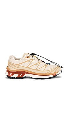Salomon XT-6 GTX Sneaker in Almond Milk, Soft Clay & Burnt Ochre from Revolve.com | Revolve Clothing (Global)