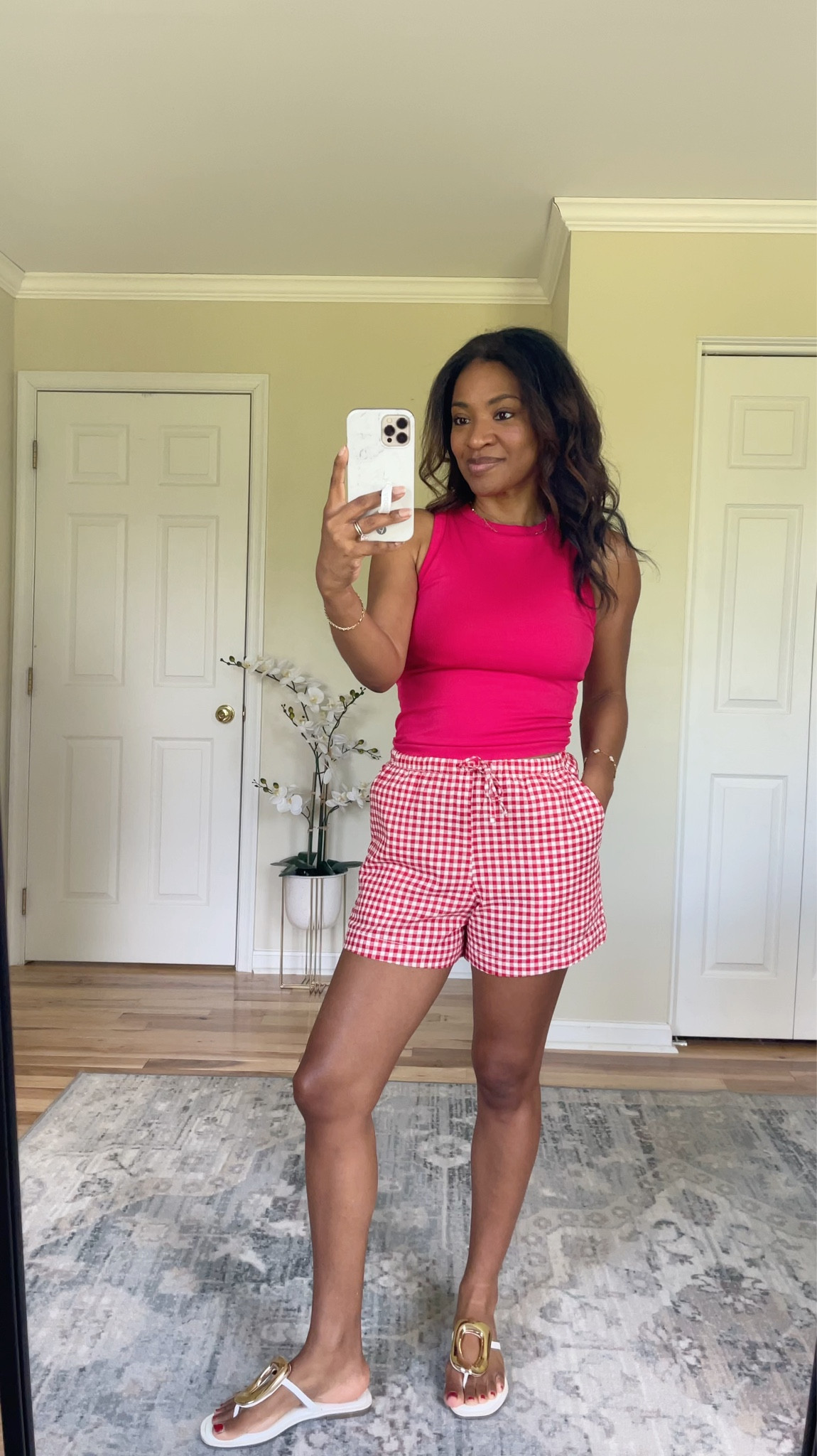Wearing a medium in the top (I recommend sizing up at least two sizes if you have a large cup size like I do). And wearing a small in the shorts which are TTS  

#LTKgrwm #LTKOver40 #LTKootd