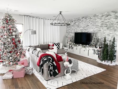 Christmas family room at Modern Farmhouse Glam Christmas tree flocked Christmas tree, chandelier, rug, media Console table, couch, sectional sofa, furniture, home, decor, seasonal holiday 

#LTKHoliday #LTKhome #LTKsalealert