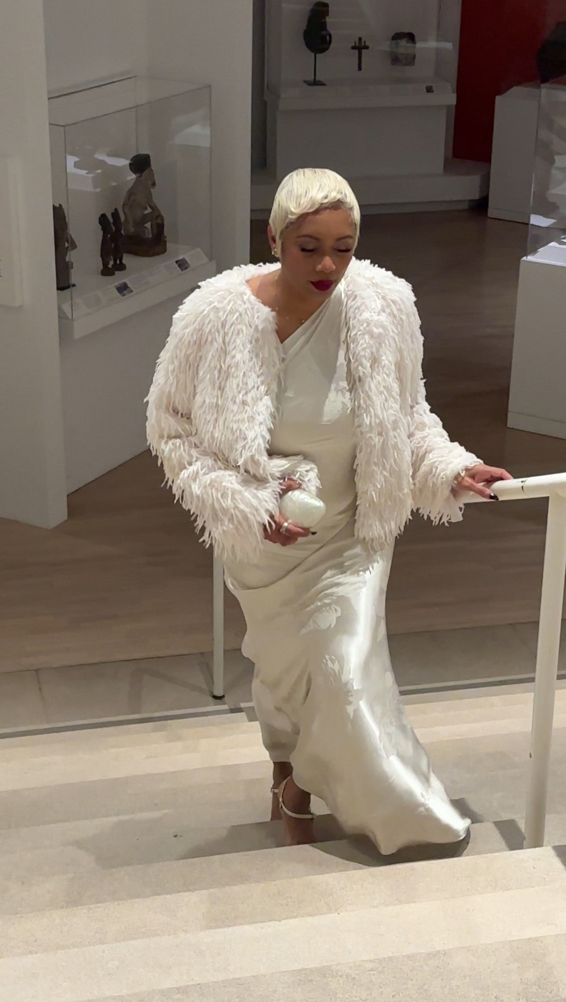Museum nights hit different in winter white. This dress is stunning but the jacket stole the show, and the gag is… it’s crazy affordable. #holidayparty #blacktieevent 

#LTKootd #LTKOver40 #LTKFindsUnder100