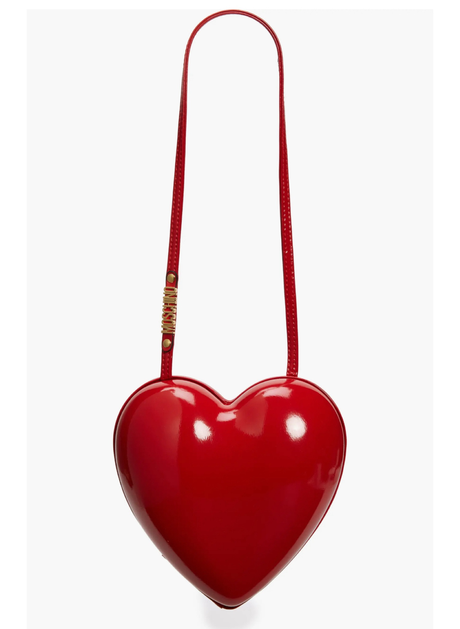 The beloved Heartbeat bag of the noughties is back and ready for a new generation to love in this lookbook-showcased standout featuring a sculptural 3D shape. The red, patent faux leather adds candy-like sweetness, while the slim shoulder strap is detailed with golden logo lettering.

Magnetic frame closure
Shoulder strap
Synthetic
Made in Italy
Designer Handbags #valentinesday #giftideasforher

#LTKparties #LTKSeasonal #LTKhome
