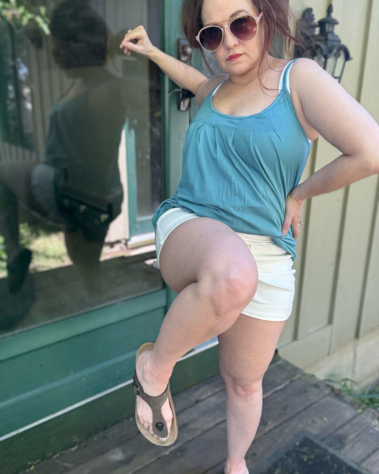 Breezy outfit, sunny day, can’t lose. ☀️ Living in this new flowy tank top layered over my favorite Shapermint sweetheart cami—such a seamless combo! Kept the summer vibes going with crisp white denim shorts, comfy cork sandals, and finished it all off with my Velvet Eyewear aviators for that perfect touch of effortless cool. Ready for the sunshine! 😎✨