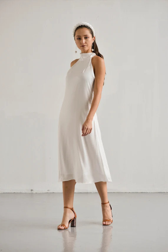 Now This Is How To Repurpose Ceremony Flowers For The Reception