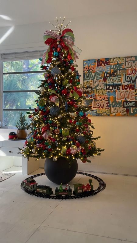 Grinch Christmas tree. Grinch Christmas train, colorful ornaments, colorful Christmas tree #meandmrjones 

#LTKhome #LTKHoliday #LTKfindsunder50