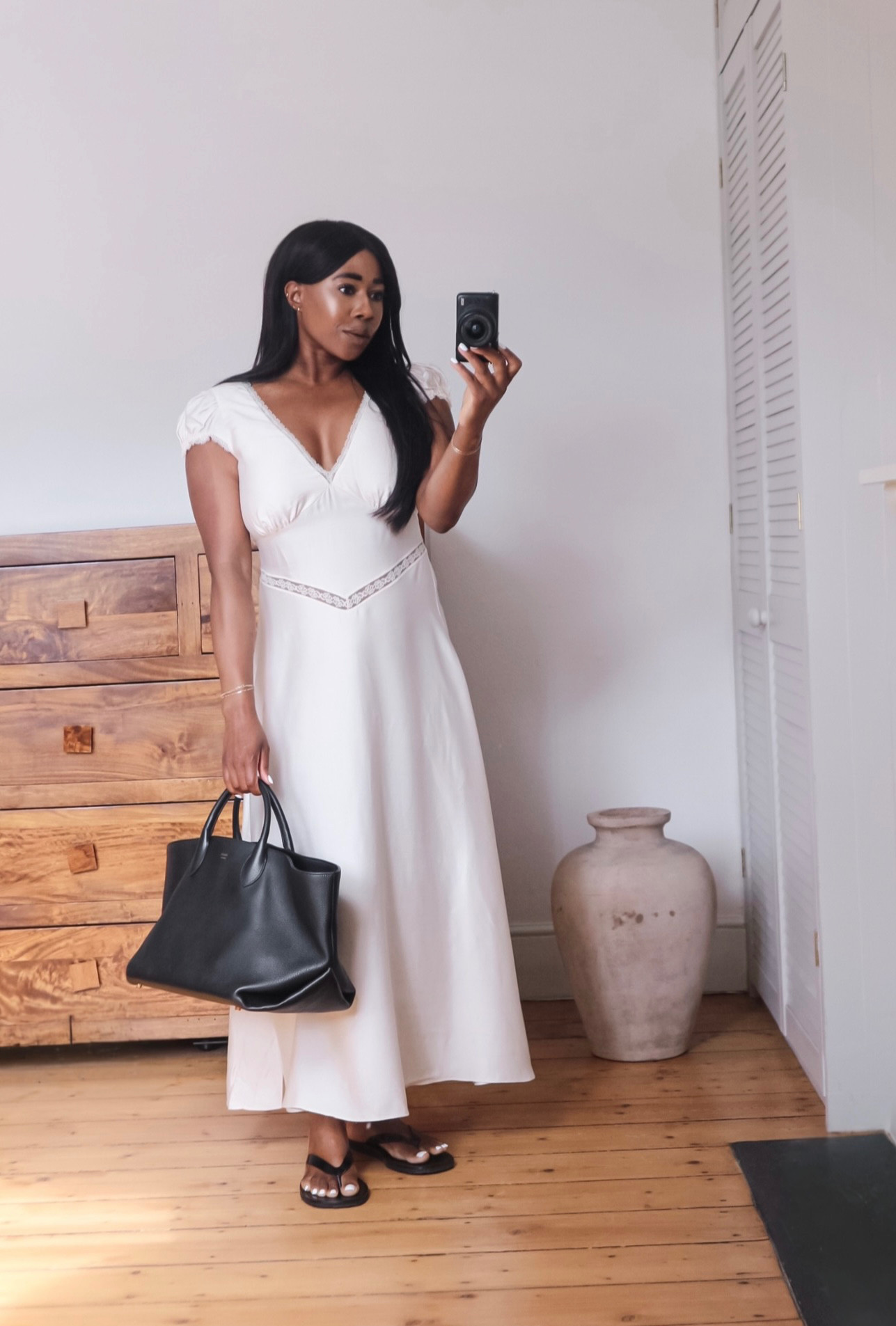 My fav way to wear a silk lace slip dress. With black + leather thong sandals & bag 🖤 

 