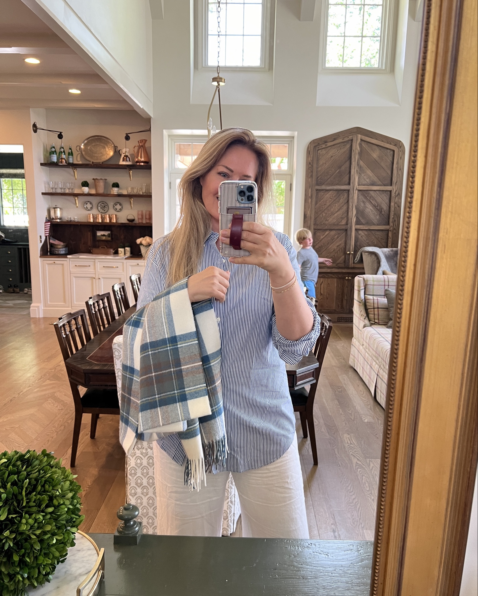 Hot summer day, movie night! I always get freezing in movie theaters but didn’t want to haul around a blanket or wear a hoodie. The wool scarf/shawl is what I grab to take every time! See options on my MillcreekManor.market website. White linen pants, men’s oversized striped shirt. Comfiest but so cute. 

#LTKStyleTip #LTKSeasonal #LTKOver40