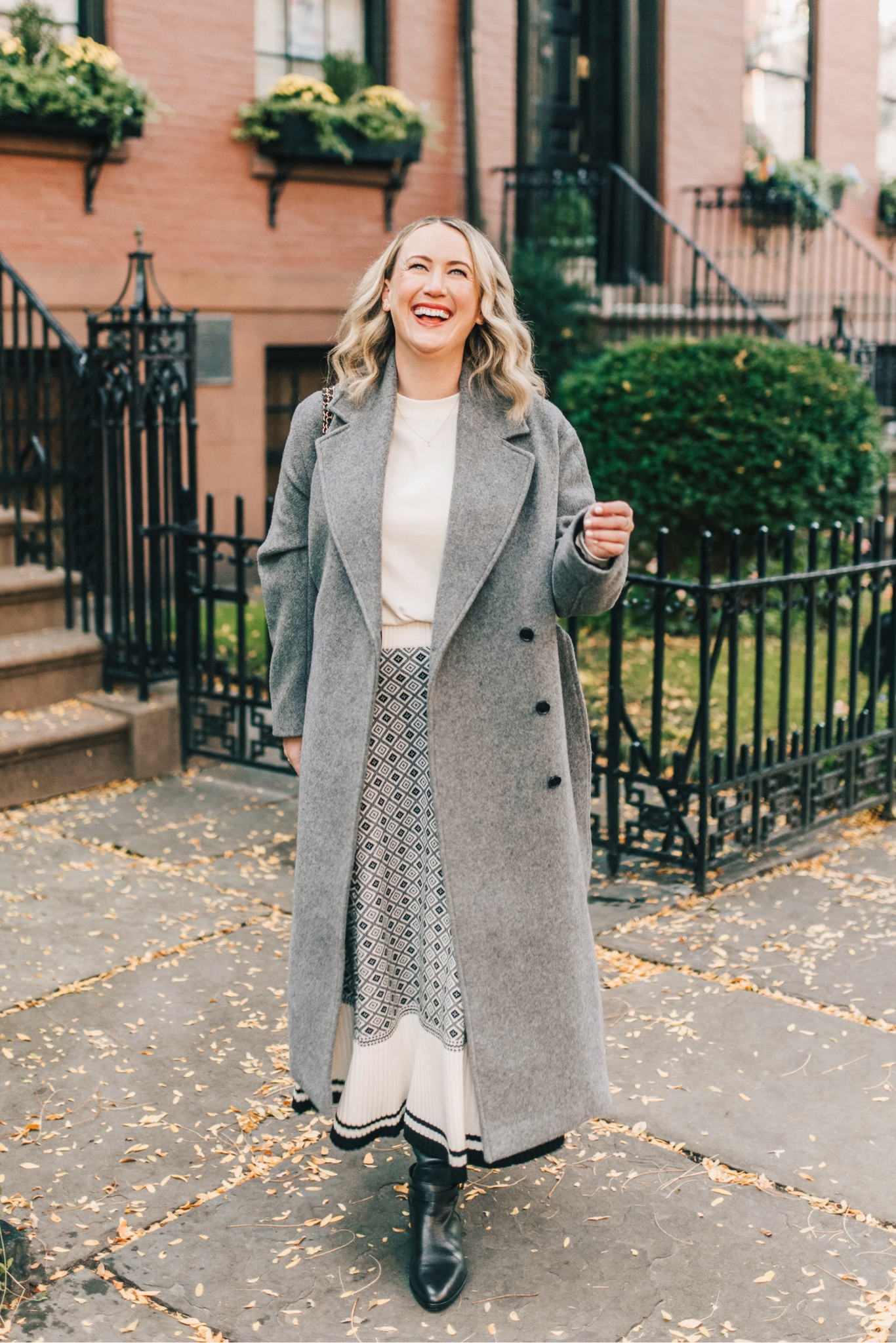 Fall outfit featuring riding boots, knit skirt (M) and wrap coat (s- runs very big!) Cos long sleeve tee (M)
Sarah flint shoes 

#LTKSeasonal
