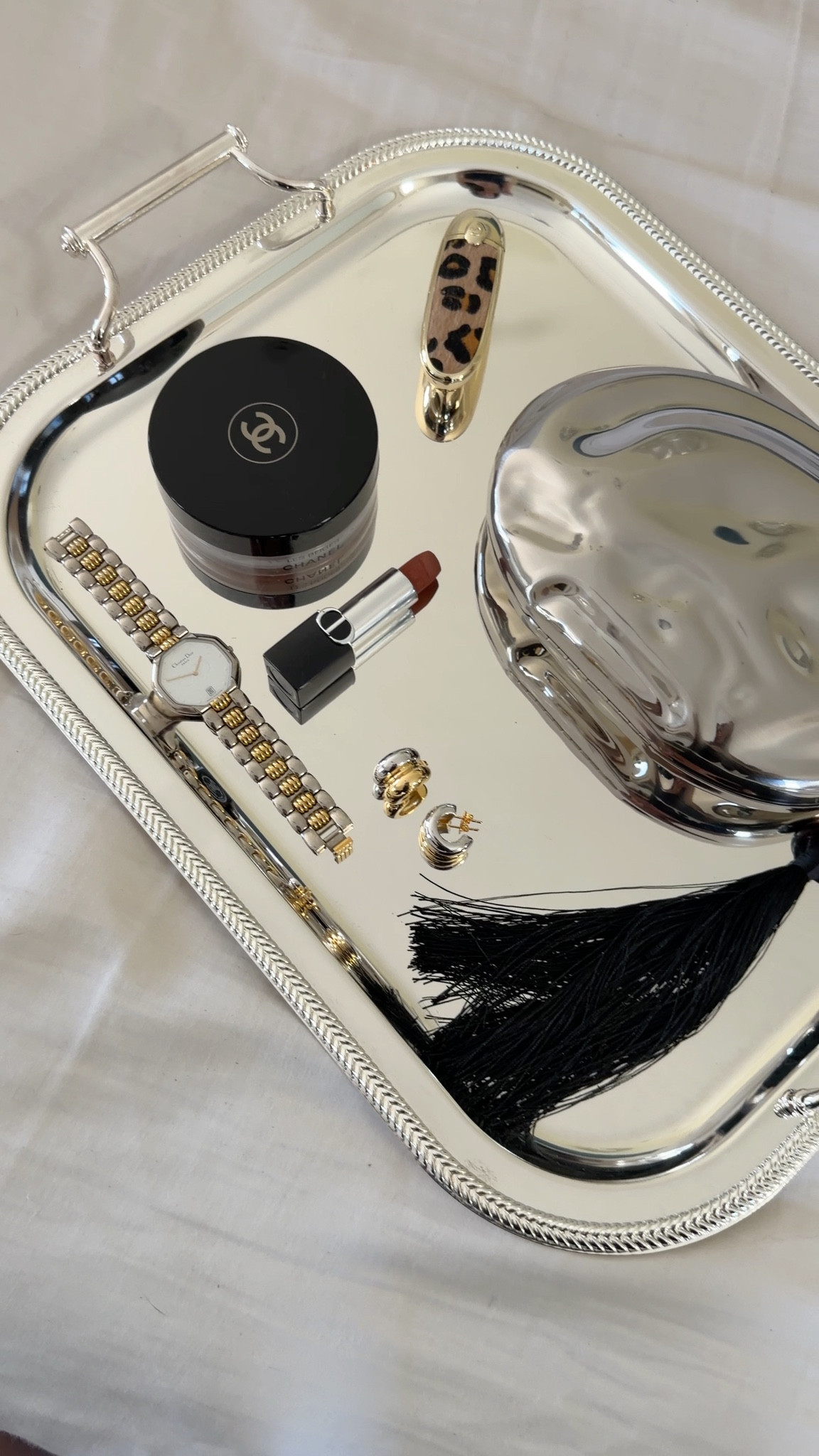 Silver tray, gold, and silver earrings, accessories, makeup, beauty, leopard lipstick.

#LTKHome #LTKBeauty #LTKSaleAlert