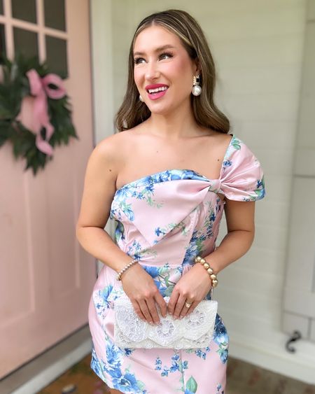 Ok I’m feeling this floral printed cocktail dress. It has an interesting shape and it’s pink 😍. I think this is perfect for a wedding guest, cocktail hour, garden party or graduation. Is it in the running a spring fizz? 

#LTKfindsunder100 #LTKstyletip