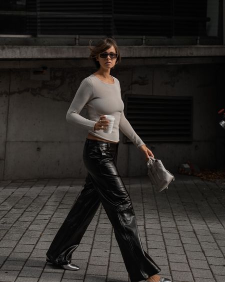 Coffee run wearing faux leather pants and silver ballerinas. 