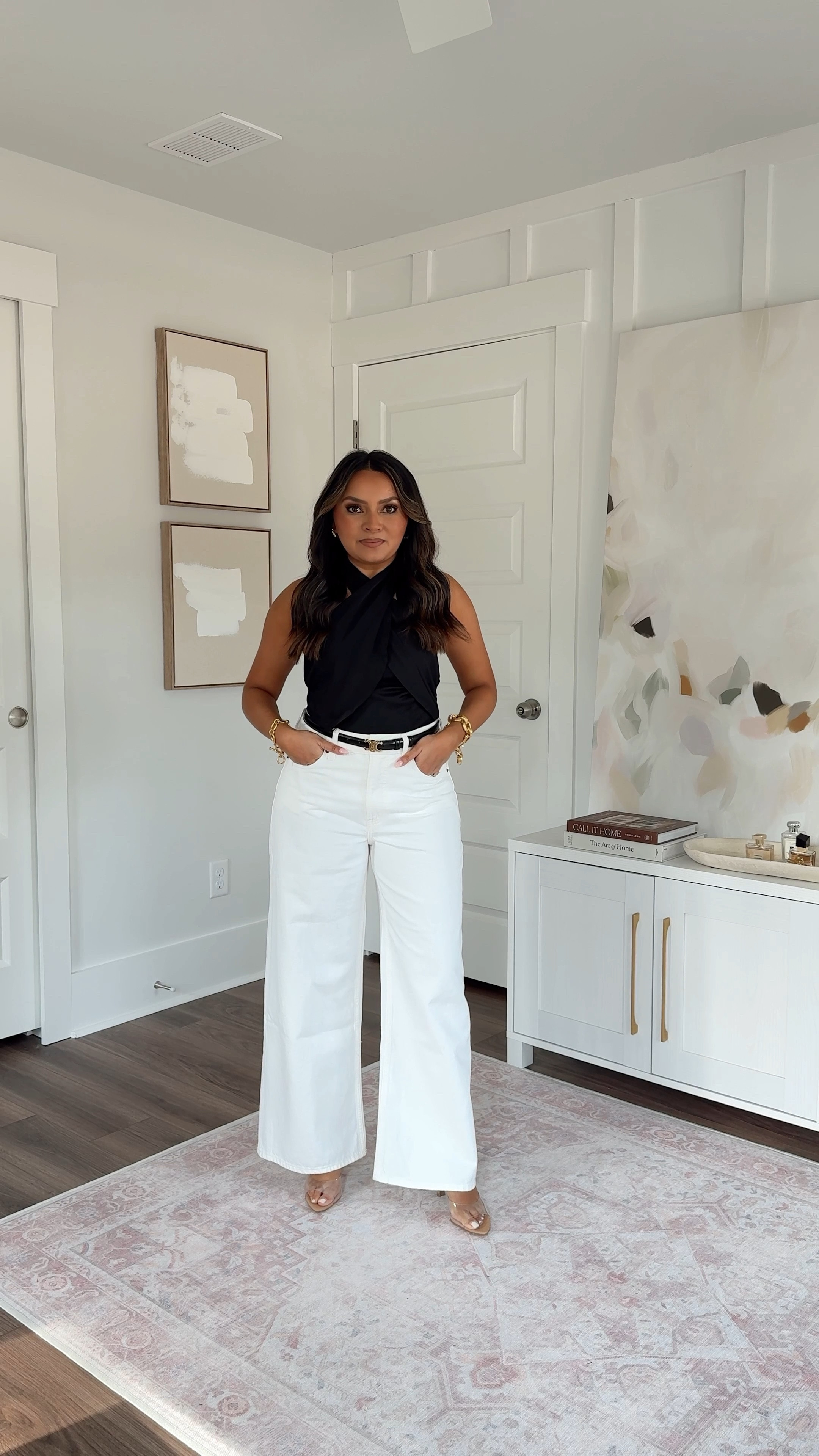 On sale plus an extra 15% off with code DENIMAF
For reference: I’m a 32b bra size and 2/26 in bottoms, pear shaped. 

Black halter neck top size xs TTS 
White jeans in white size 26 short TTS 
Clear heels size 5 TTS 
Belt is from Celine


#LTKStyleTip #LTKPetite #LTKSaleAlert