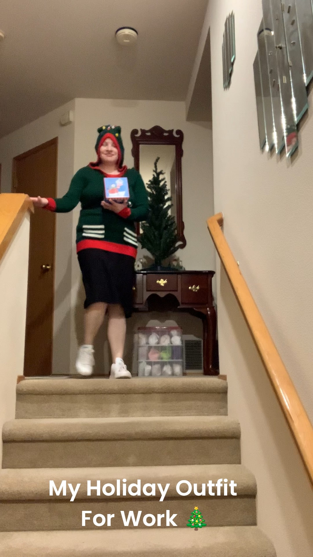 This is the outfit I wore at work today. I wore this cute Christmas Tree 🌲 Sweater with a Hood. I also wore. My Calvin Klein Skirt and my Adidas Sneakers. It was a busy day. 

#LTKHoliday #LTKdayinmylife #LTKootd