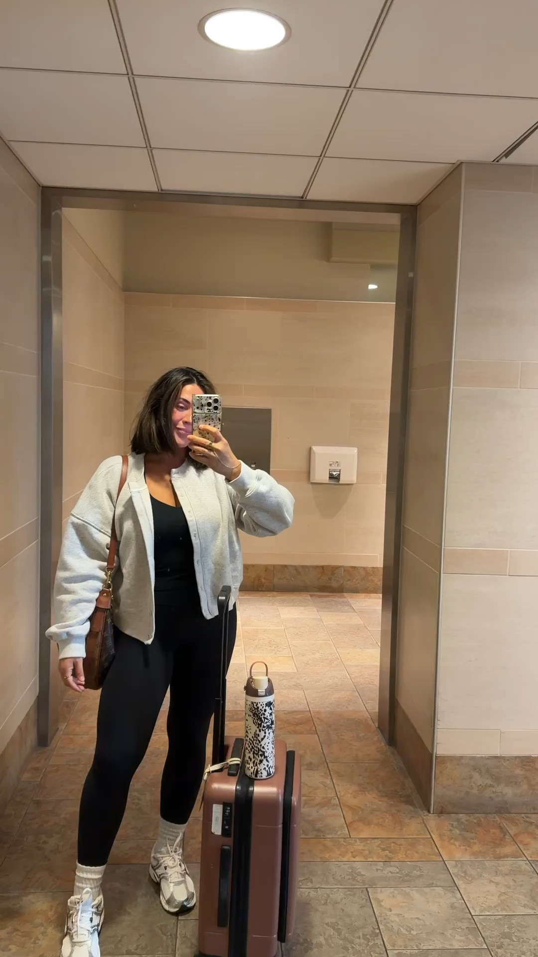 Casual fall travel outfit, leggings of course! Size L in all :) my tank has a built in bra so no bra on flight for me. Shoes are 12/10 comfy.

#LTKootd #LTKActive #LTKTravel