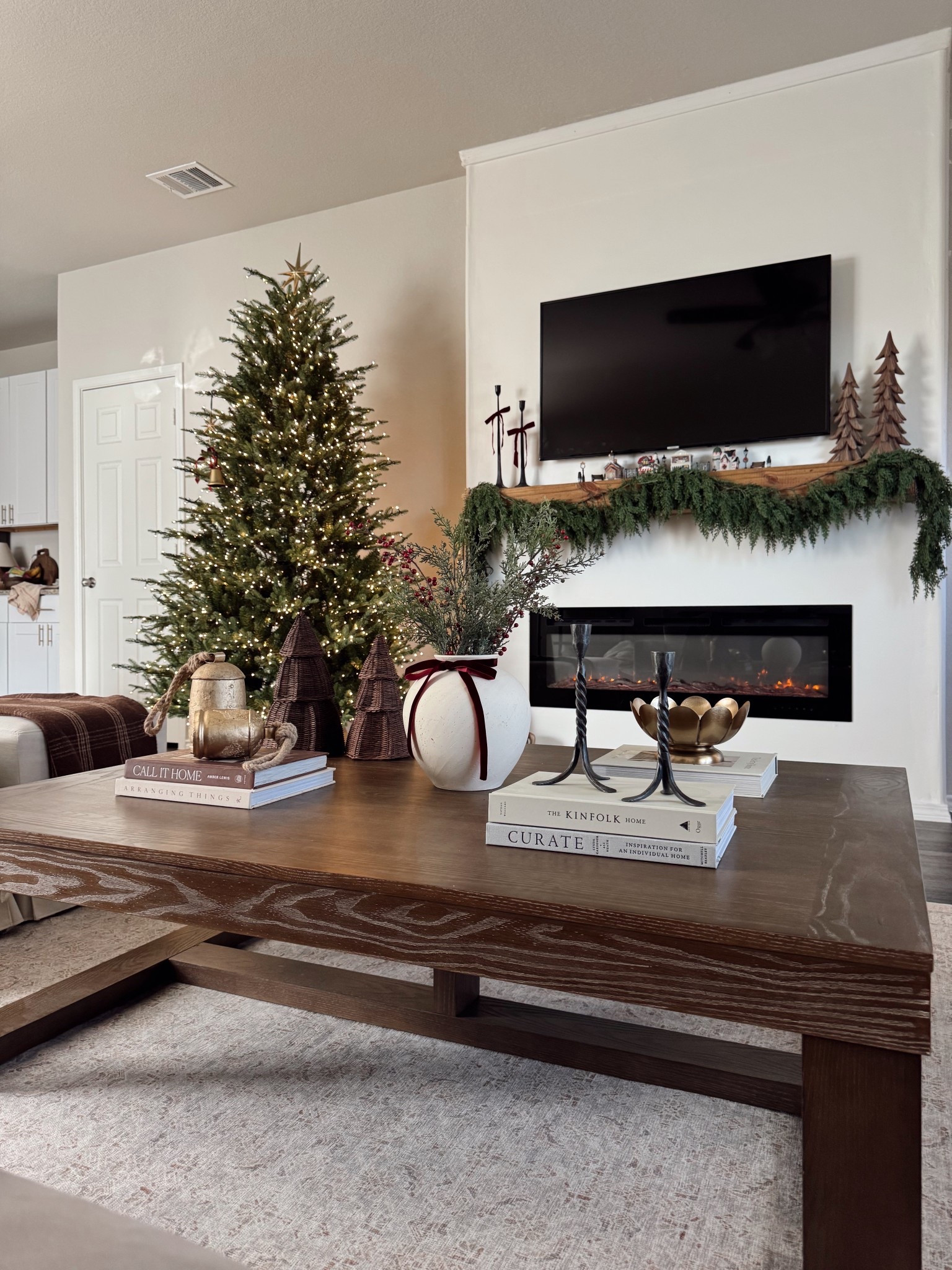 cozy christmas coffee table styling 🎄💫🤎 vase, stems and bells are hobby lobby! i’ll link similar 🫶🏼

#LTKStyleTip #LTKHome #LTKFindsUnder50