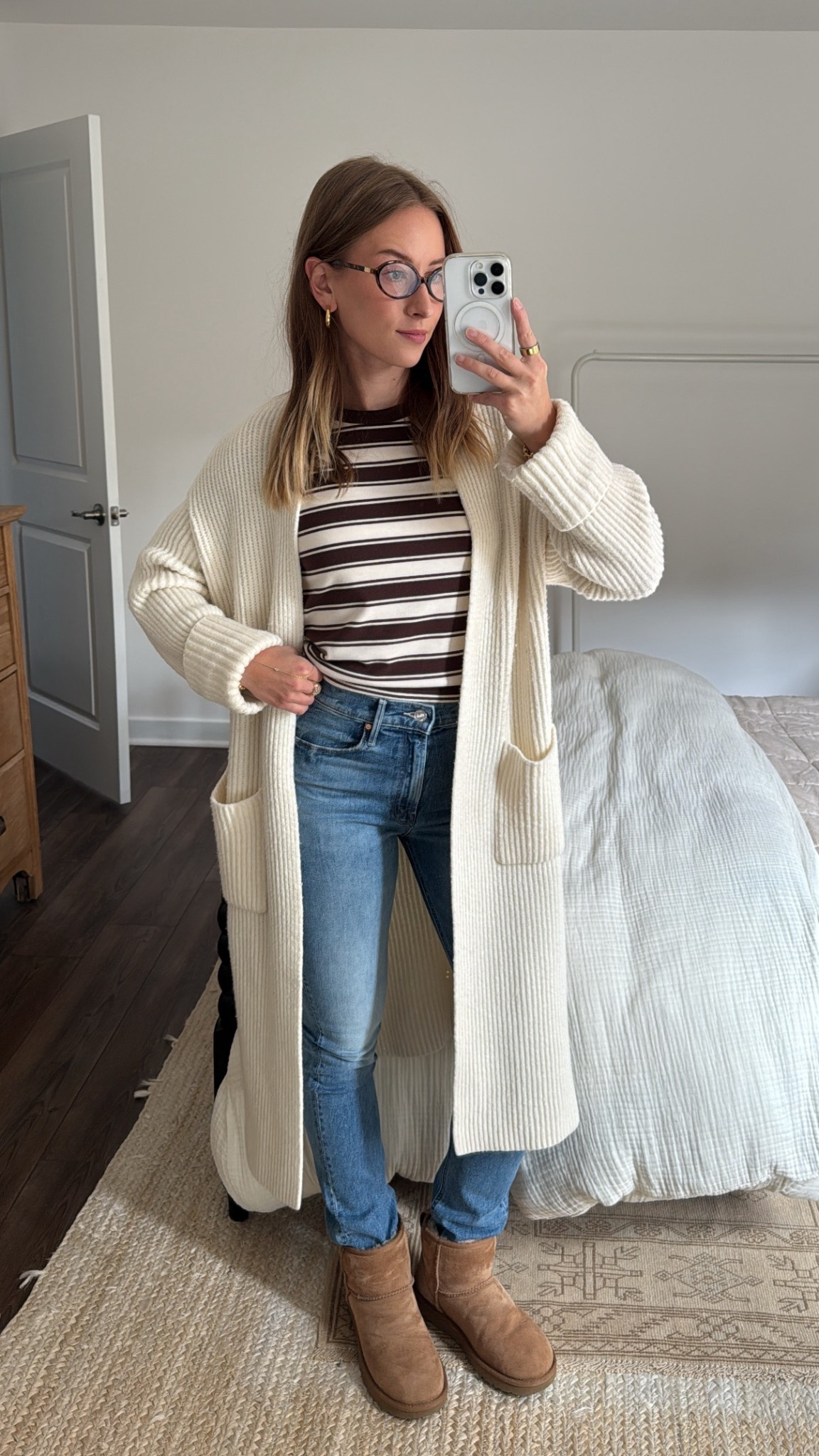 10/16/25 Keeping it simple and cozy today 🤍 Linking my go-to fall uniform — my UGG mini boots, light wash MOTHER jeans that go with everything, and a long white cardigan duster that’s the perfect layering piece for crisp fall days. 

#LTKSeasonal #LTKShoeCrush #LTKStyleTip