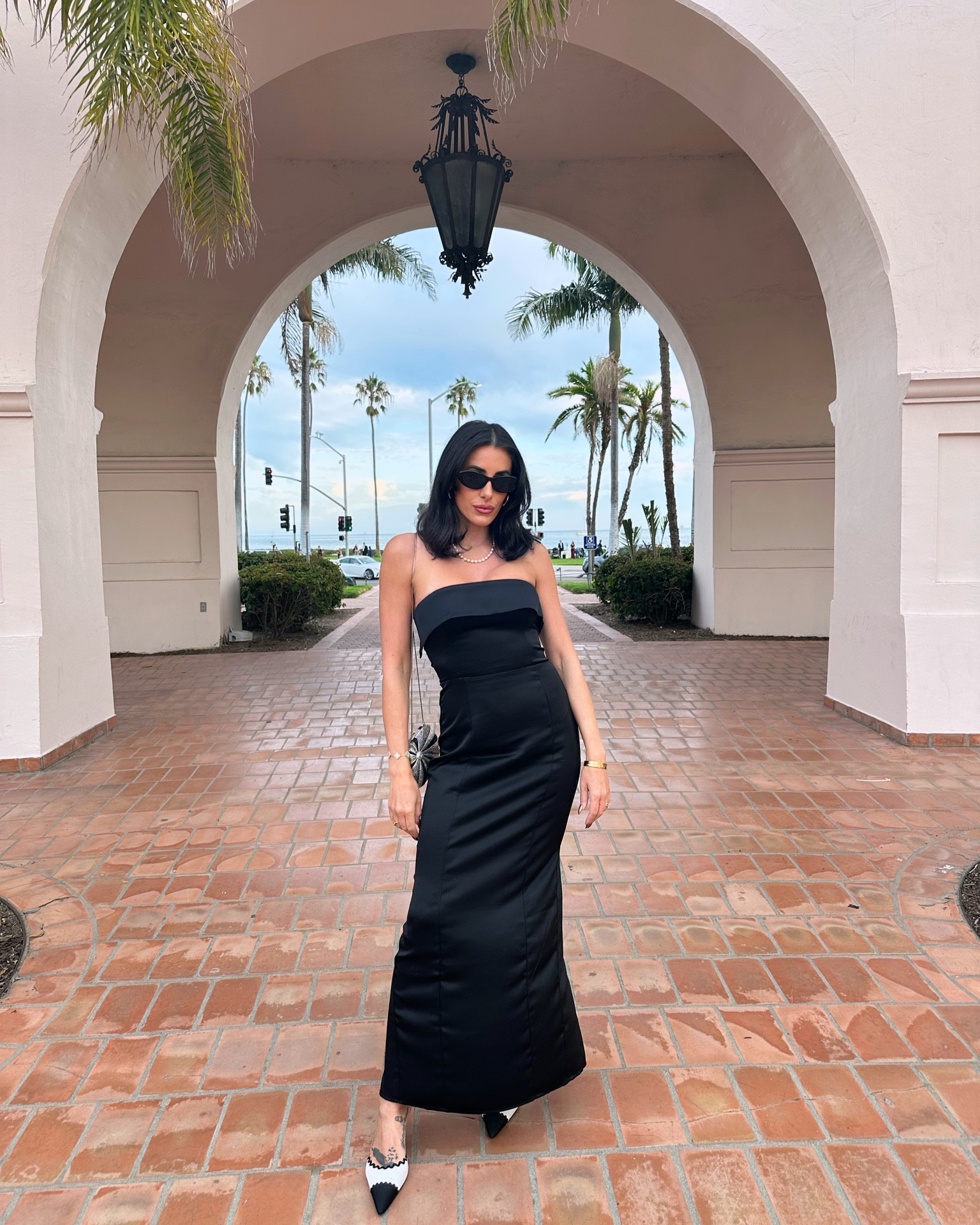 Black tie wedding guest in Santa Barbara inspo #tagmyswag 

Earrings: Bottega
Sunglasses: Prada
Bag: Judith Leiber 
Dress: Reformation
Shoes: Helsa

#LTKwedding #LTKtravel #LTKparties