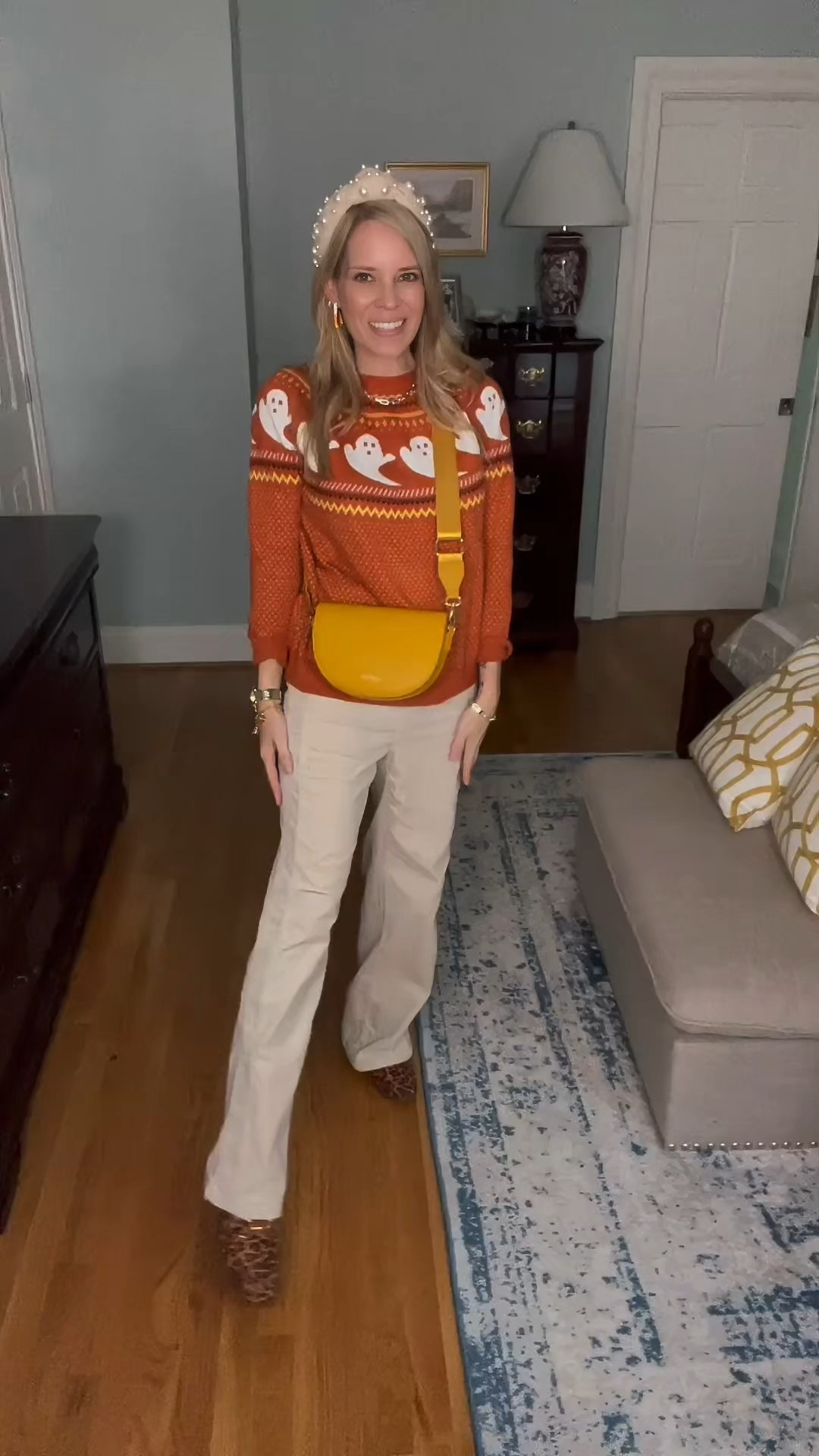 👻 Festive & cozy for fall! I styled this orange ghost sweater with wide-leg cream pants and leopard print mules for a playful yet chic take on Halloween style. I added my favorite yellow crossbody bag, candy corn earrings, and a neutral headband for a fun pop of seasonal flair. 🍂✨

This is such an easy outfit for October outings, pumpkin patches, or a casual Halloween get-together. The mix of cozy knits, statement accessories, and a touch of leopard makes it feel elevated while still festive. 🧡

ghost sweater Amazon, Halloween outfit inspo, cozy fall sweater, festive fall outfit, casual October style, pumpkin patch outfit idea, leopard print mules, Amazon Halloween sweater, chic spooky season outfit, fall fashion 2025


#LTKFindsUnder50 #LTKItBag #LTKShoeCrush

#LTKFindsUnder100 #LTKFindsUnder50 #LTKItBag