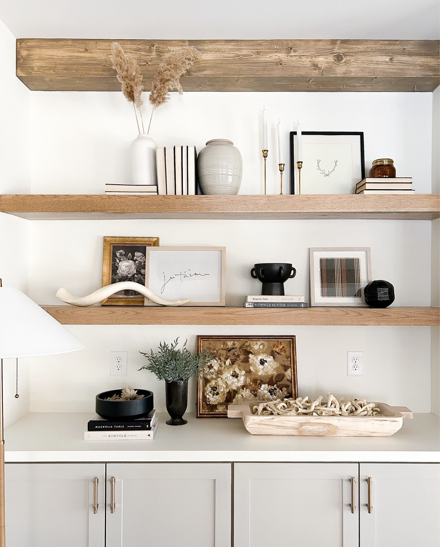 Living room
Living room shelves
Shelf decor
Neutral decor
Built in shelves
Black and white decor
Neutral artwork
Shelfie
Vases
Home decor
New home finds 

#LTKstyletip #LTKhome #LTKfindsunder50